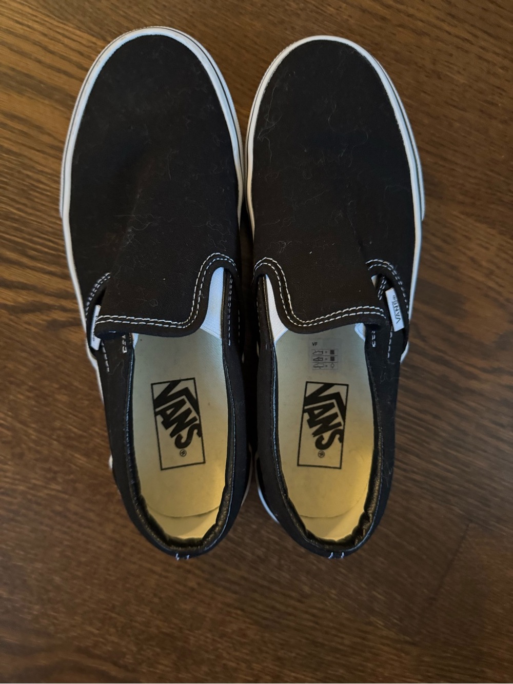 Vans Black Canvas Slip-On Loafers with White Trim